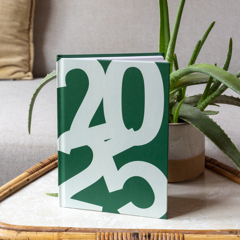 fotoboeken vlakliggend 2025 a5 staand op tafel fotoboeken vlakliggend 2025 a5 staand op tafel