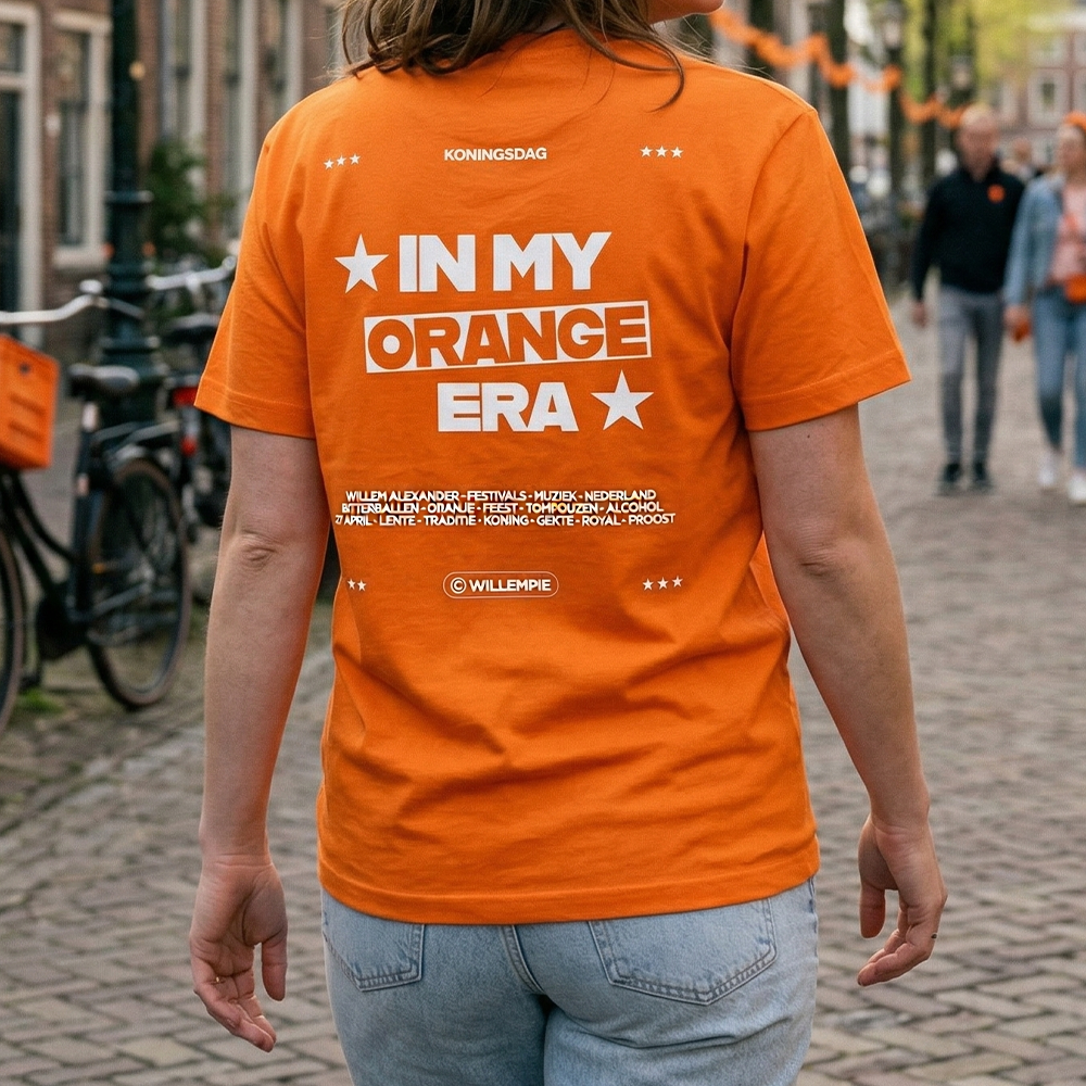 Oranje T shirt met tekst in my orange era gedragen op straat Oranje T shirt met tekst in my orange era gedragen op straat